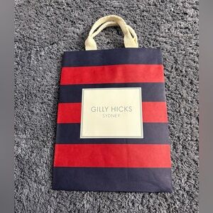 Brand new empty red and blue striped Gilly Hicks Sydney bag with fabric handles